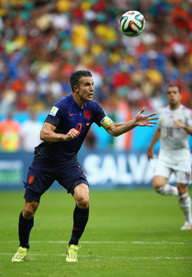 Illustration for article titled The Best Photos Of Robin Van Persie's Amazing Flying Header Goal